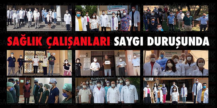 Sağlık çalışanları saygı duruşunda