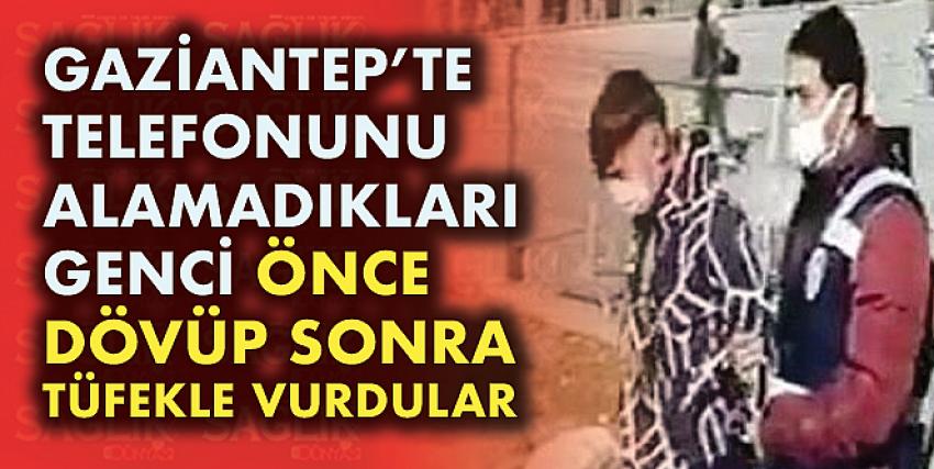 Telefonunu alamadıkları genci önce dövüp sonra tüfekle vurdular