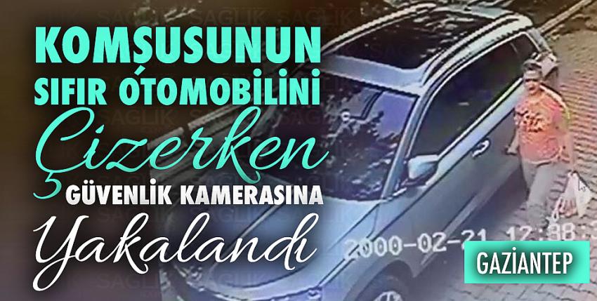 Komşusunun sıfır otomobilini çizerken güvenlik kamerasına yakalandı